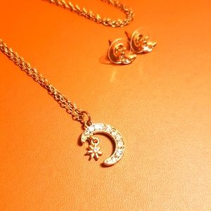 Gold necklace with moon and start pendant and matching earrings set